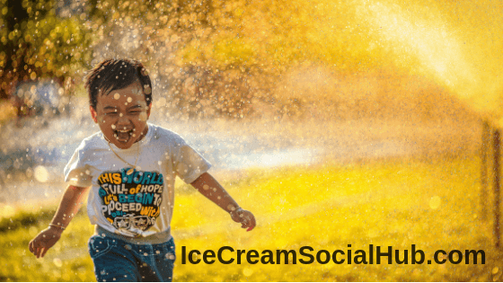 Kid Running Through A Fountain Of Water SummerTime Fun For Military Families