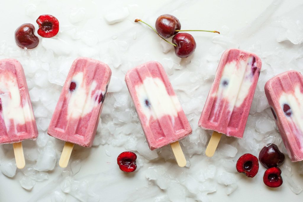 berries on top of ice cream